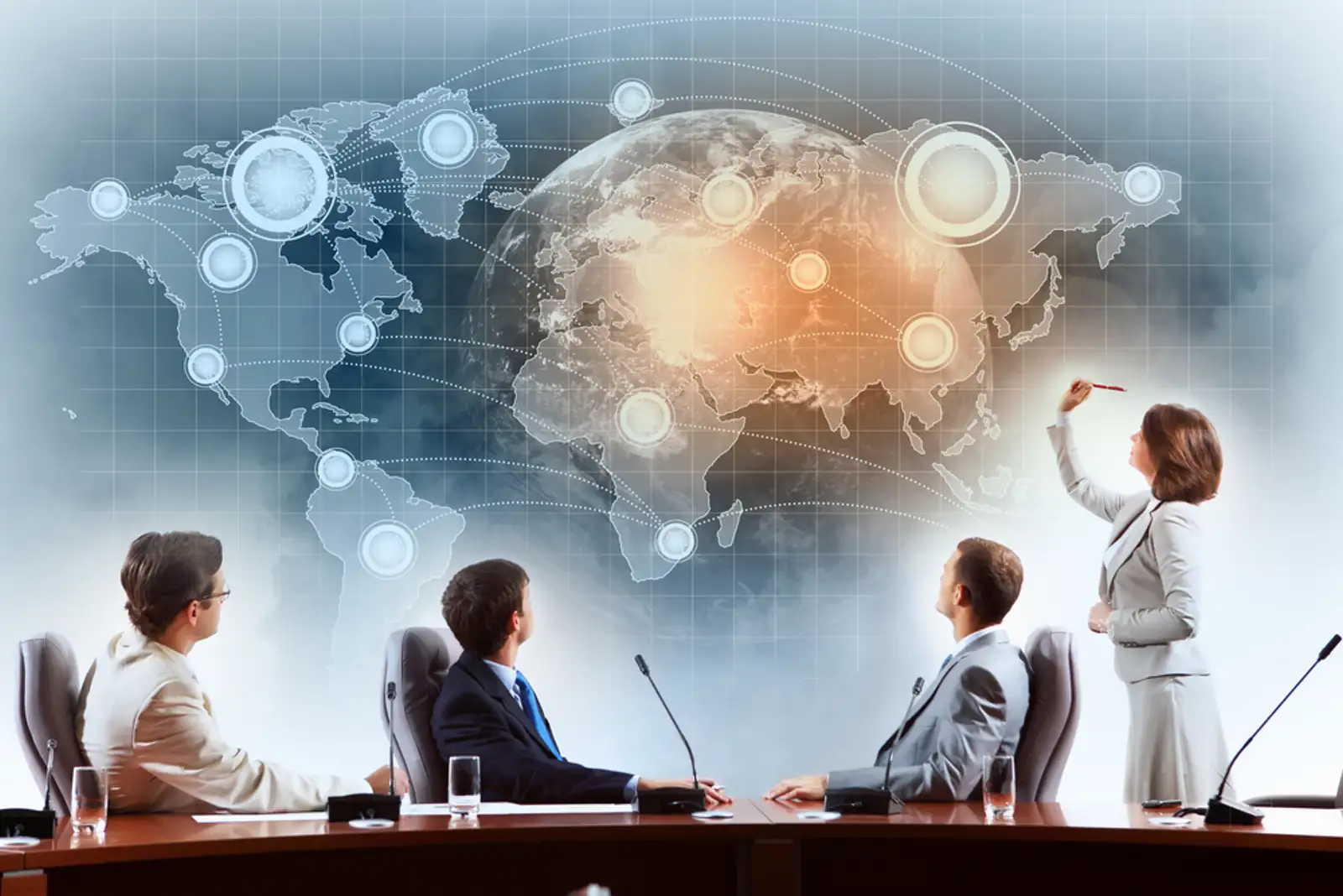 Image of businesspeople at presentation looking at virtual project.jpeg