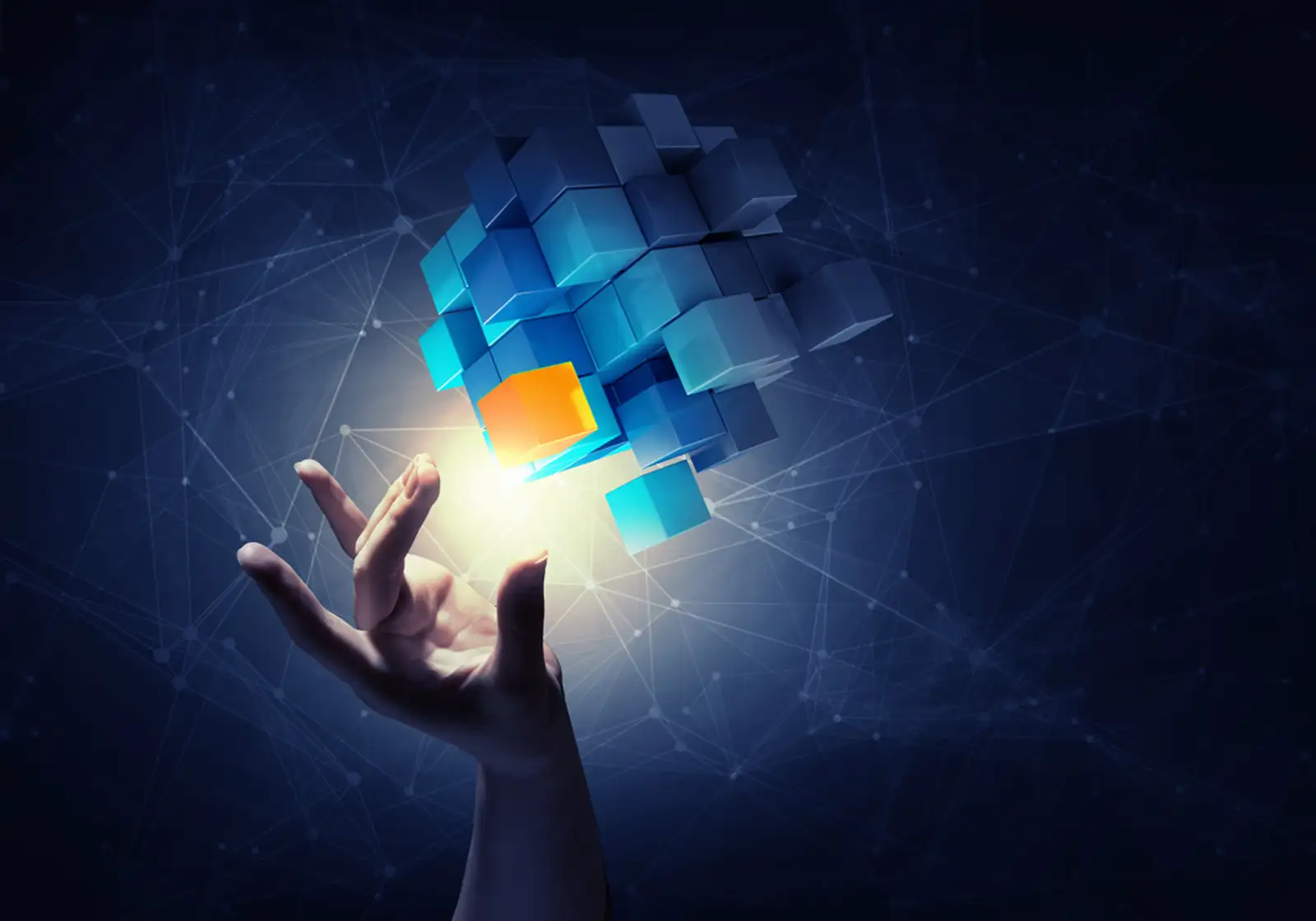 Businesswoman hand touch cube as symbol of problem solving.jpeg