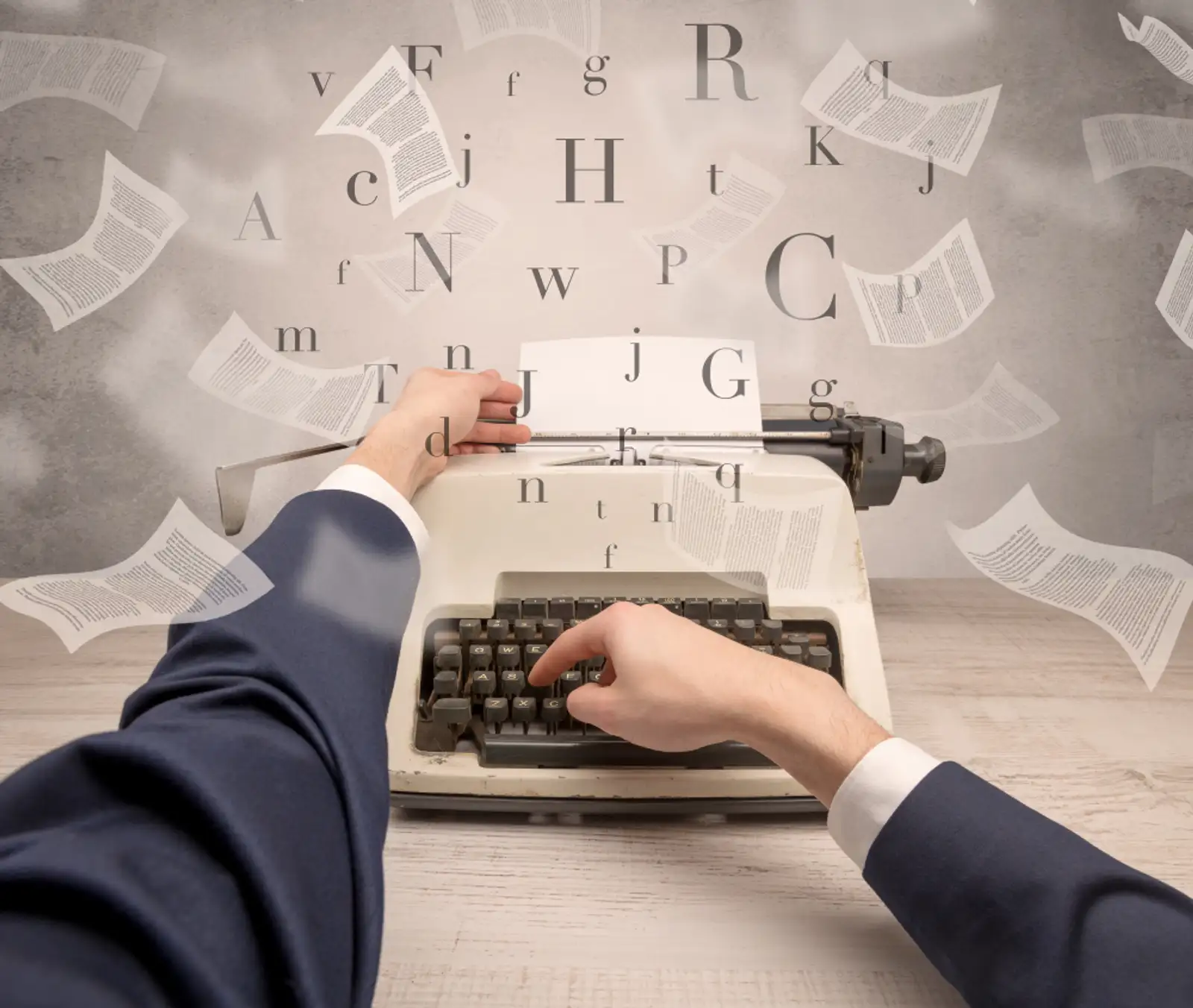 First person perspective hand typewriting with flying documents around.jpeg