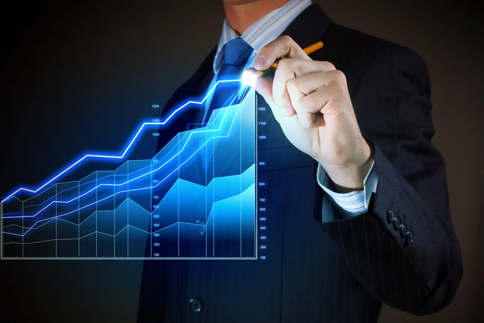 Closeup image of businessman drawing 3d graphics.jpeg