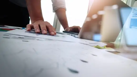 Double exposure of businessman hand working with new modern computer and business strategy as concept-1.jpeg