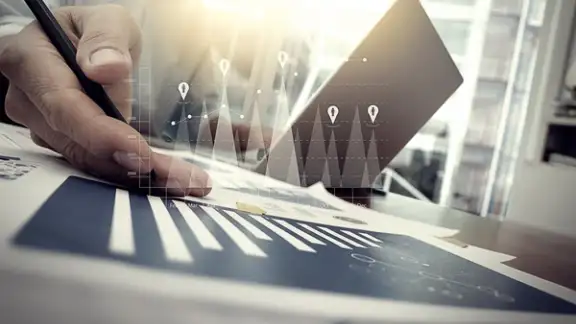 business documents on office table with smart phone and digital tablet and graph financial with social network diagram and man working in the background.jpeg