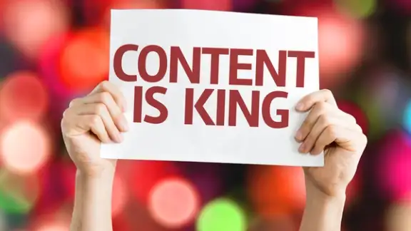 Content is King card with colorful background with defocused lights.jpeg