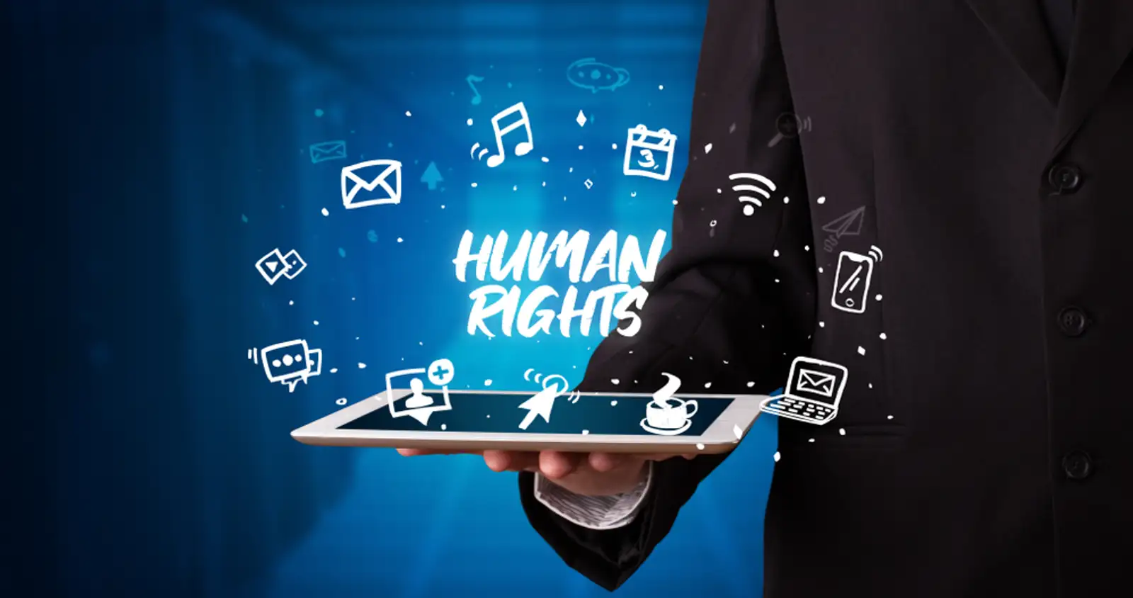 Young business person working on tablet and shows the inscription HUMAN RIGHTS.jpeg