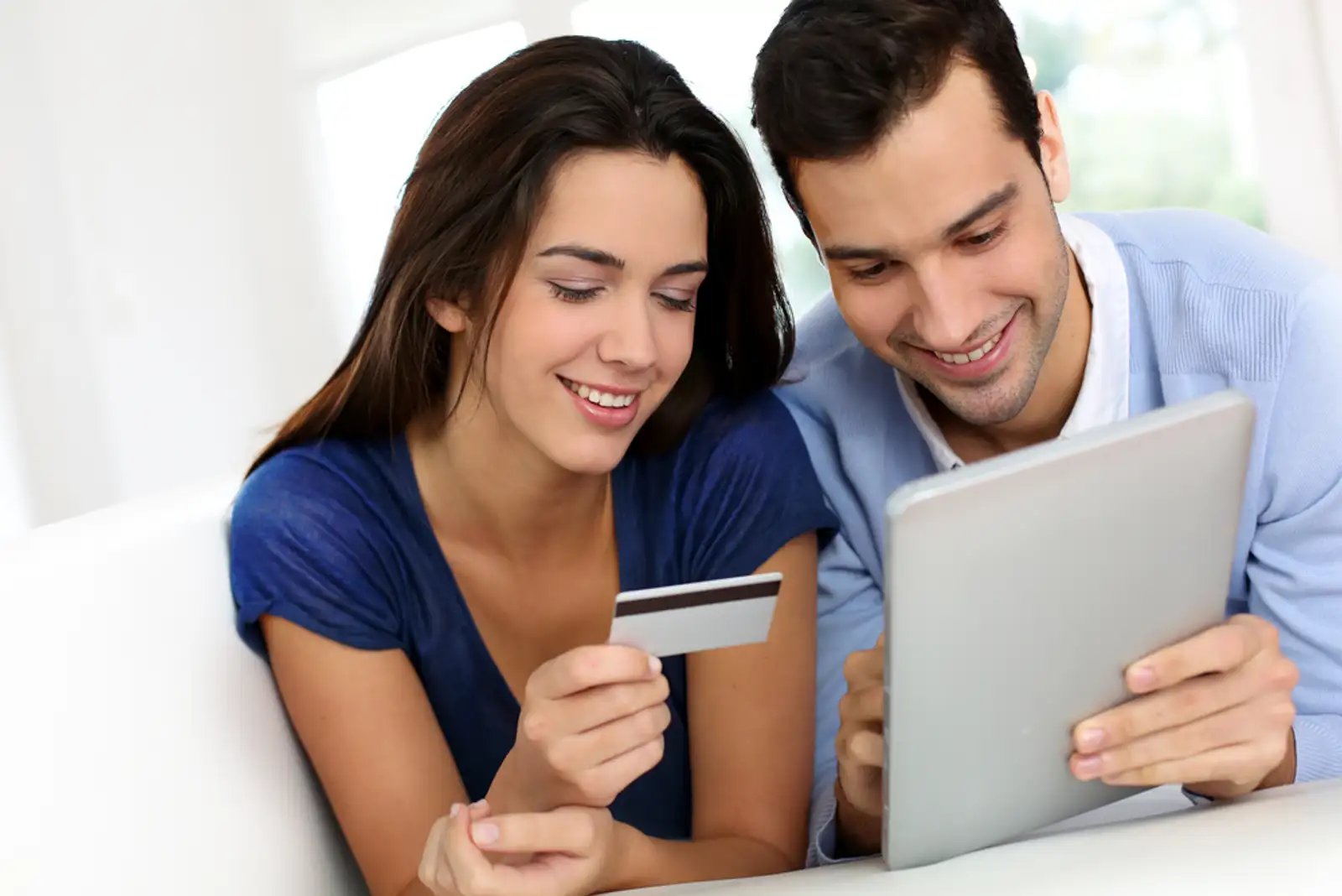 Young couple shopping online from home.jpeg