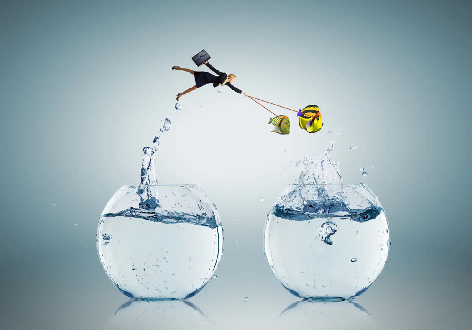 Young businesswoman and big exotic fish. Success in business.jpeg