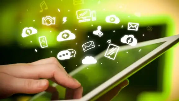 Hand holding tablet with social media concept.jpeg