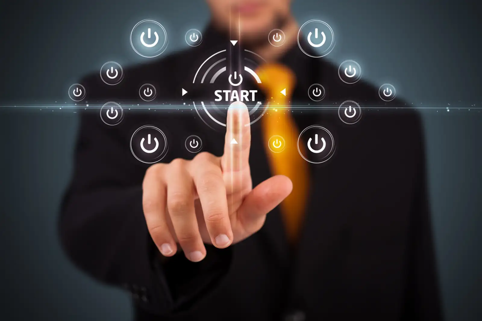 Businessman pressing simple start buttons on a virtual background.jpeg
