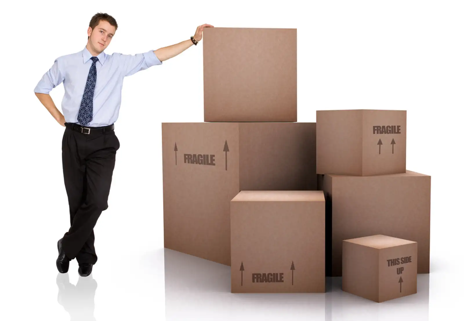 Businessman with Cardboard Boxes Over a White Background.jpeg