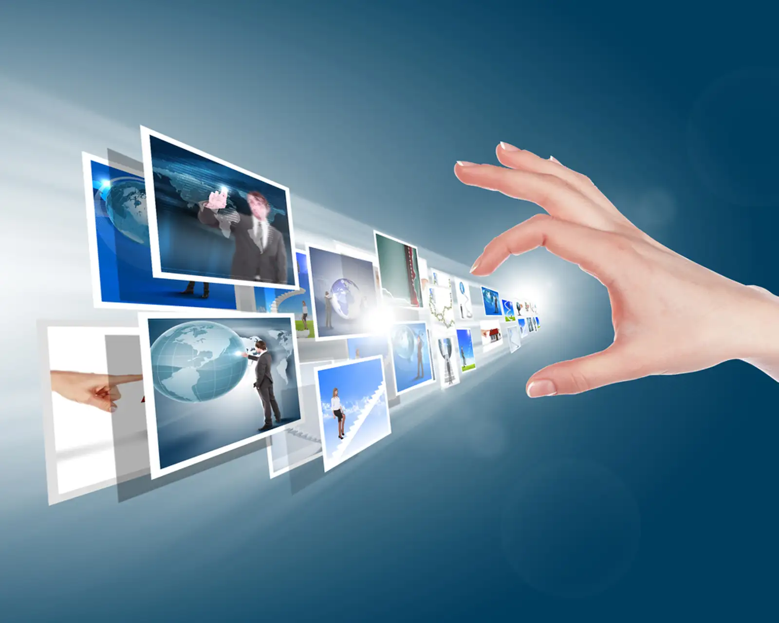 Hand touches the flow of images. Symbol of media streams.jpeg