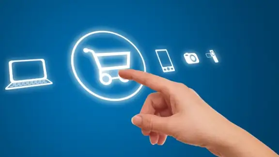 hand choosing shopping cart symbol from media icons on blue-1.jpeg