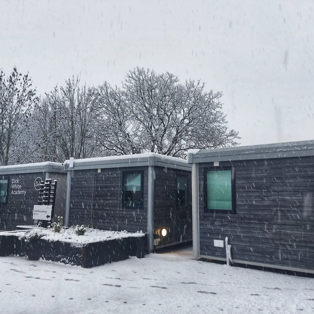 Dick White Academy in snow