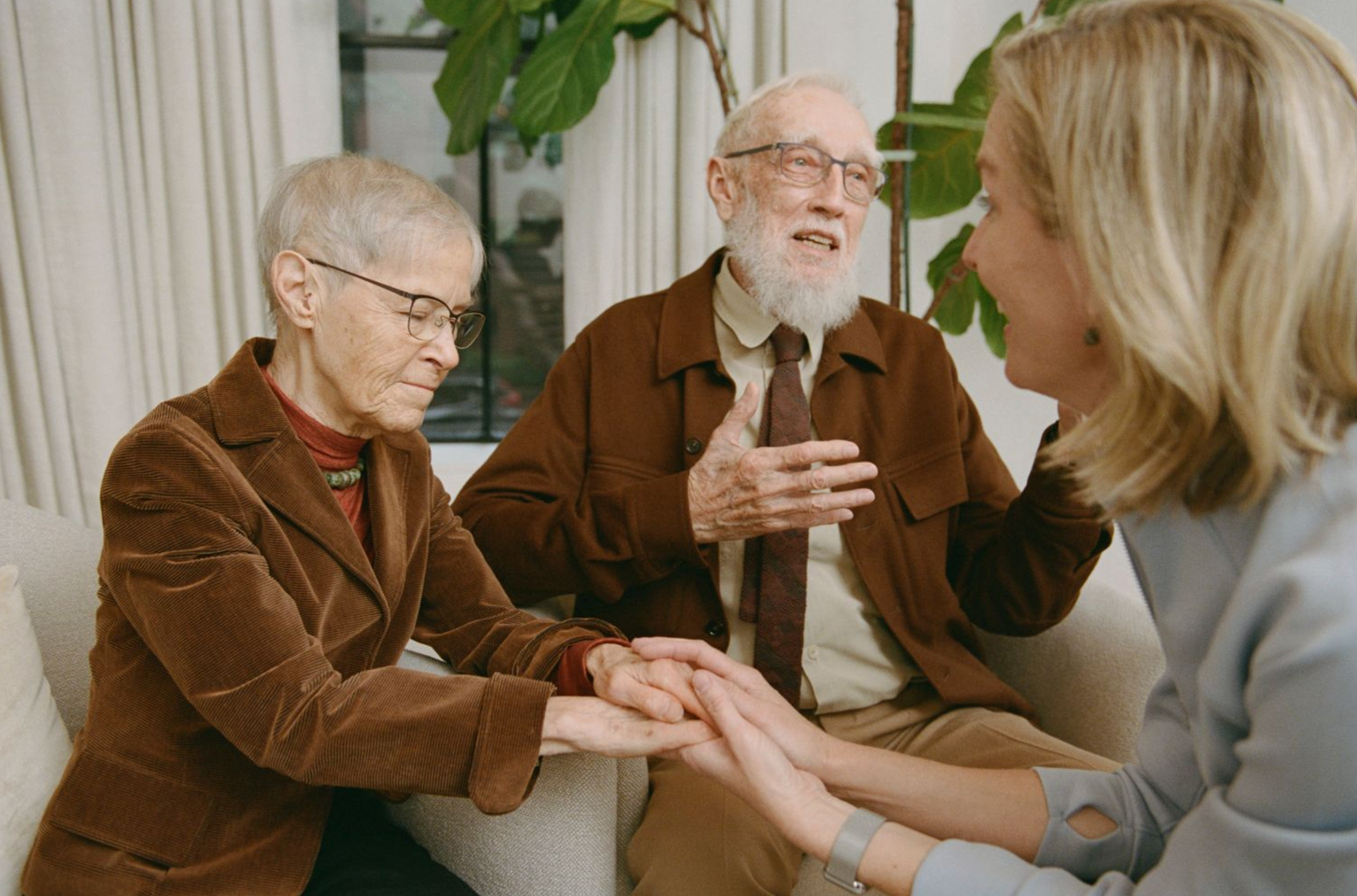 Woman holding hands with other woman
