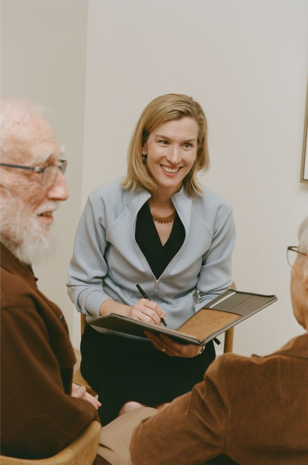 Woman listening to couple