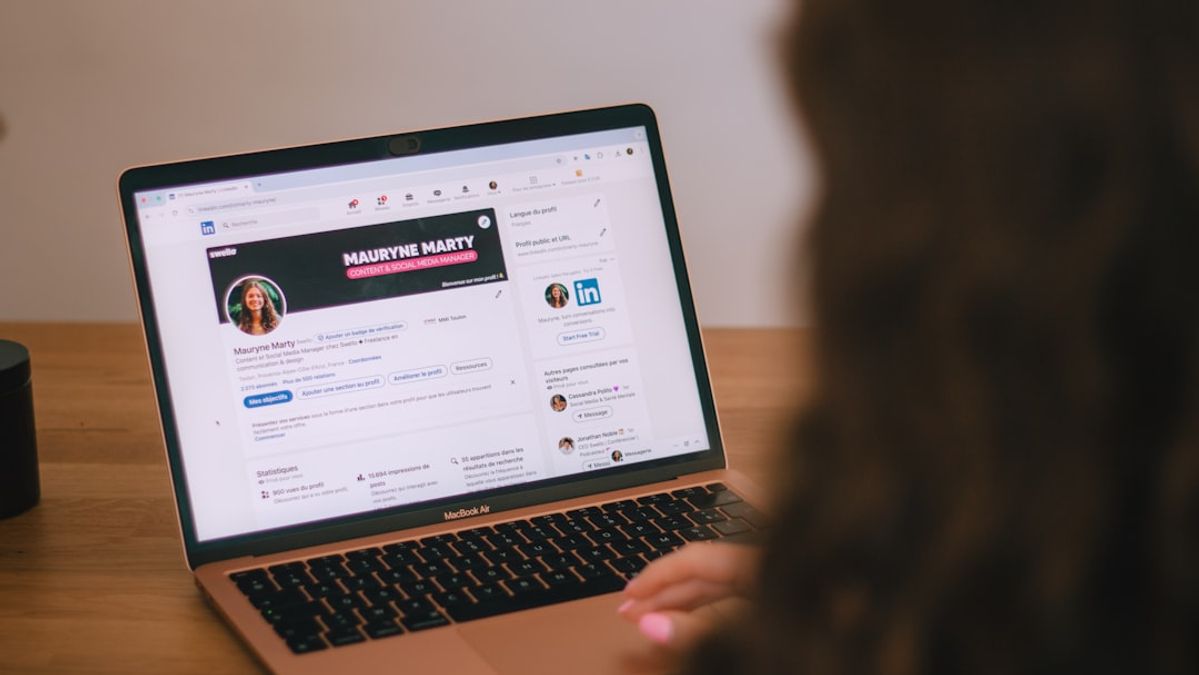 Marketer reviewing an automated email marketing sequence on a laptop