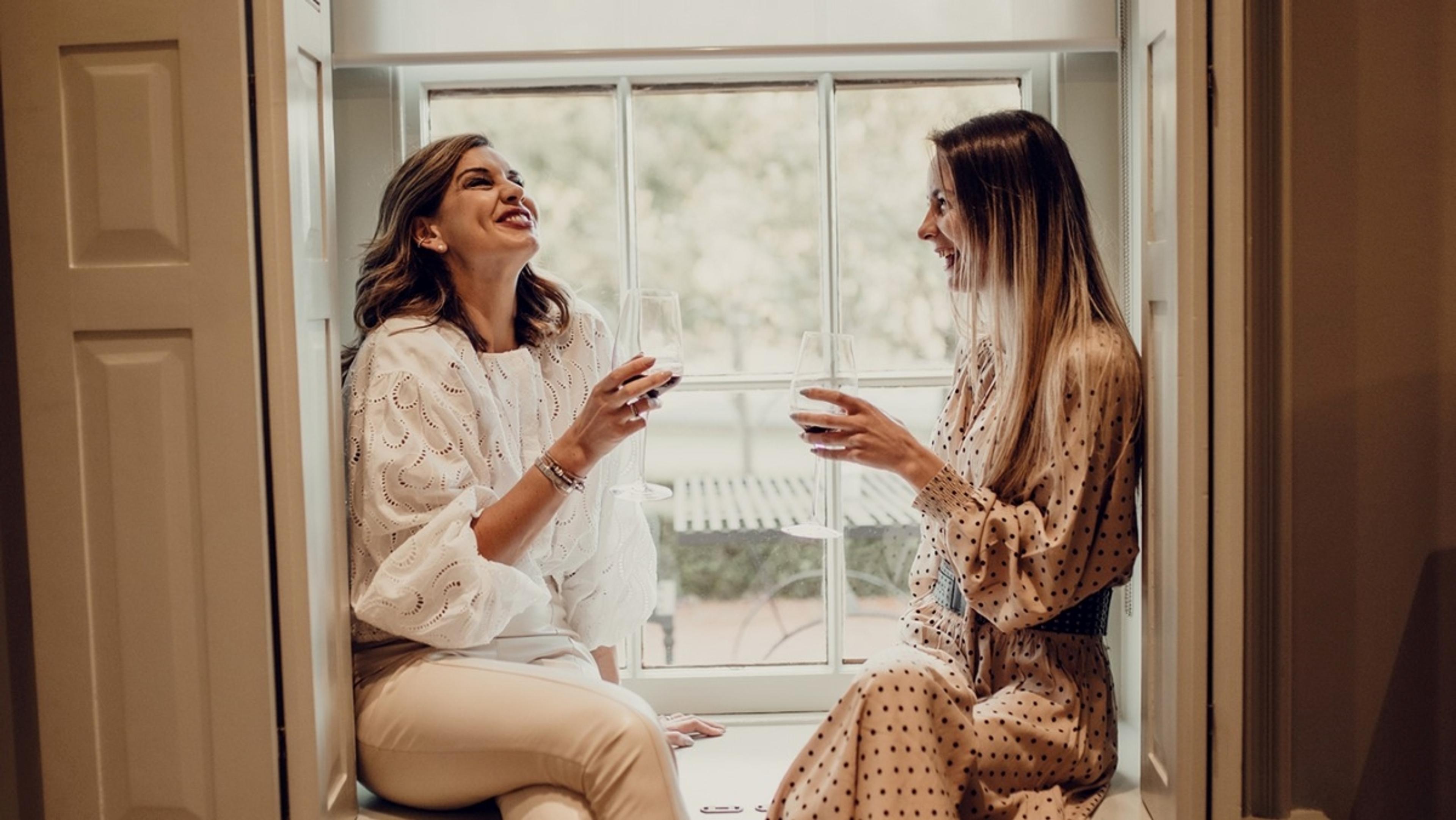 Sipping wine at Lanzerac Wine Estate