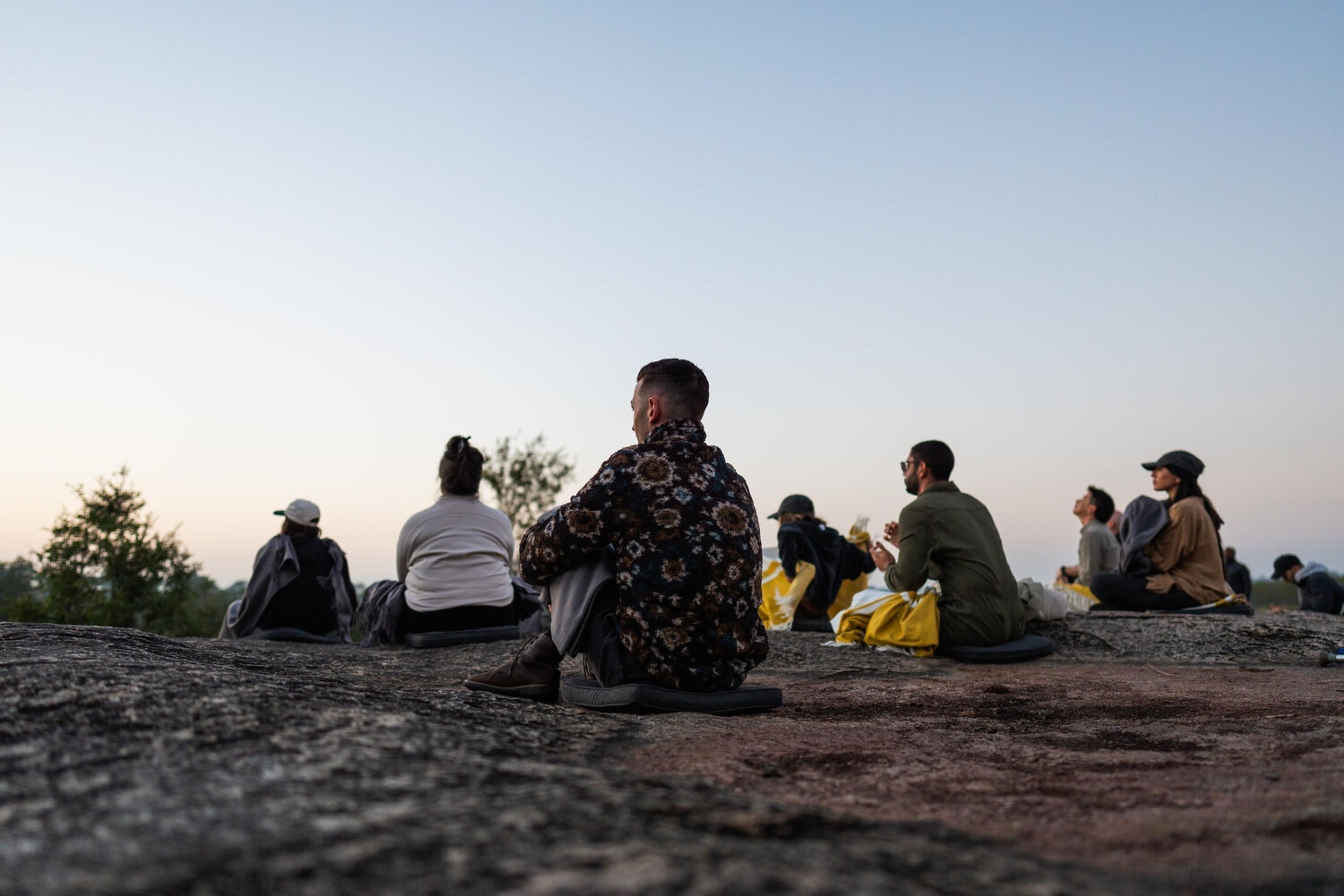 Silvan Safari friends doing a meditation in the bush