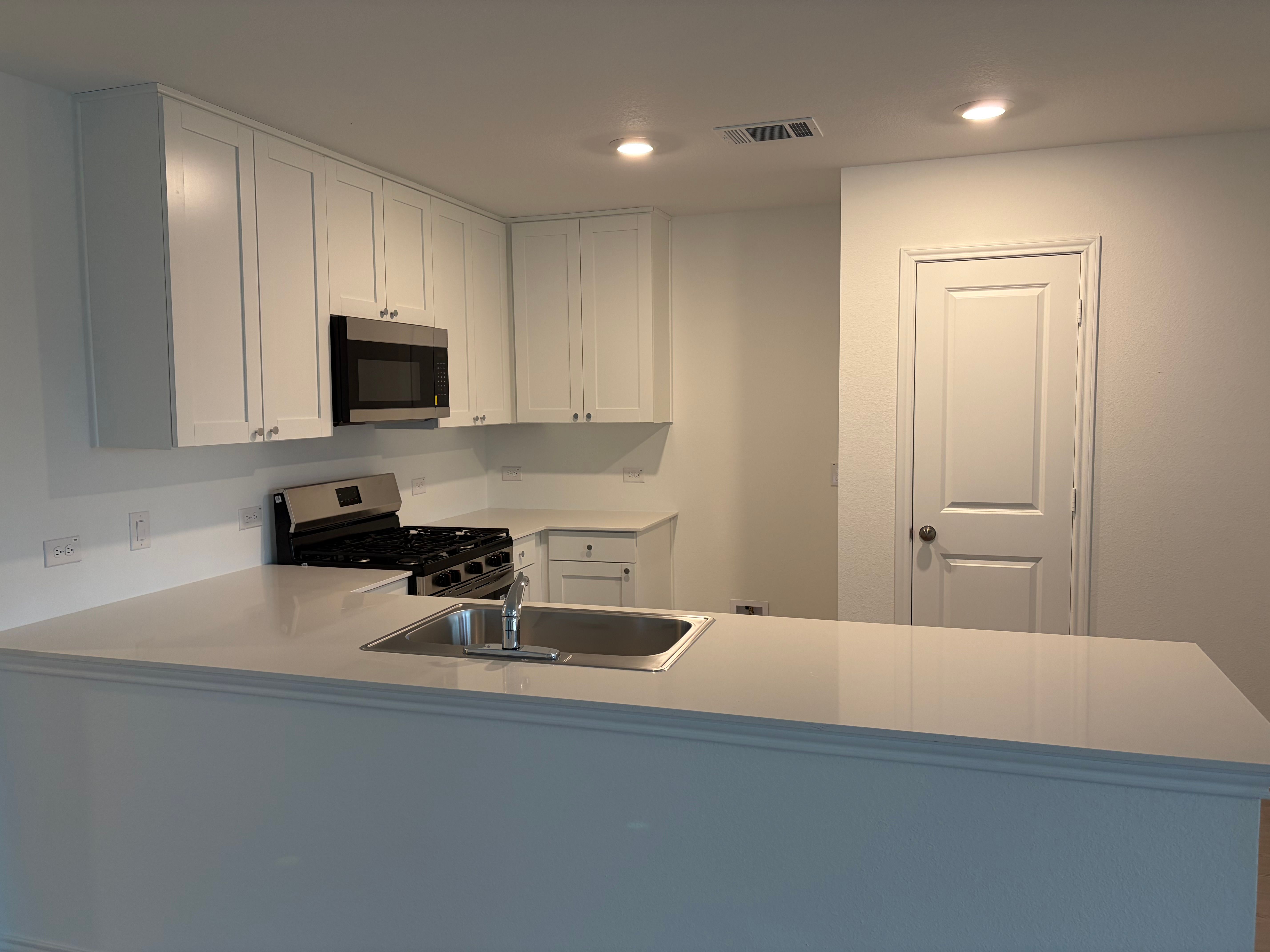 View of kitchen from dining room
