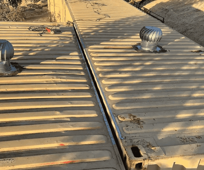 Shipping containers prepped and ready to be welded together 