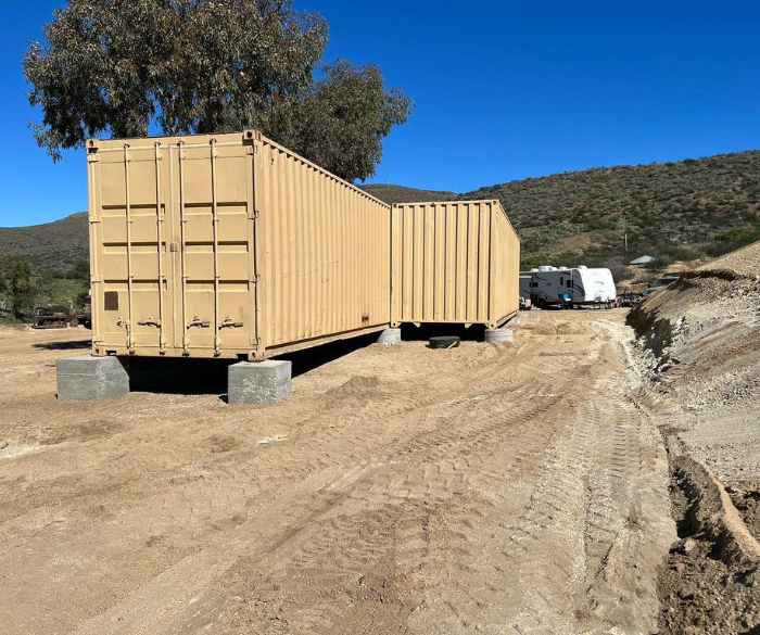 Photo of shipping containers welded together 