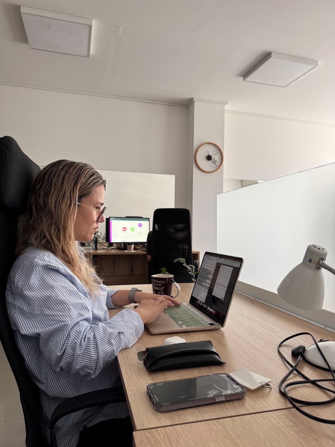 Carla working at the desk during the trip