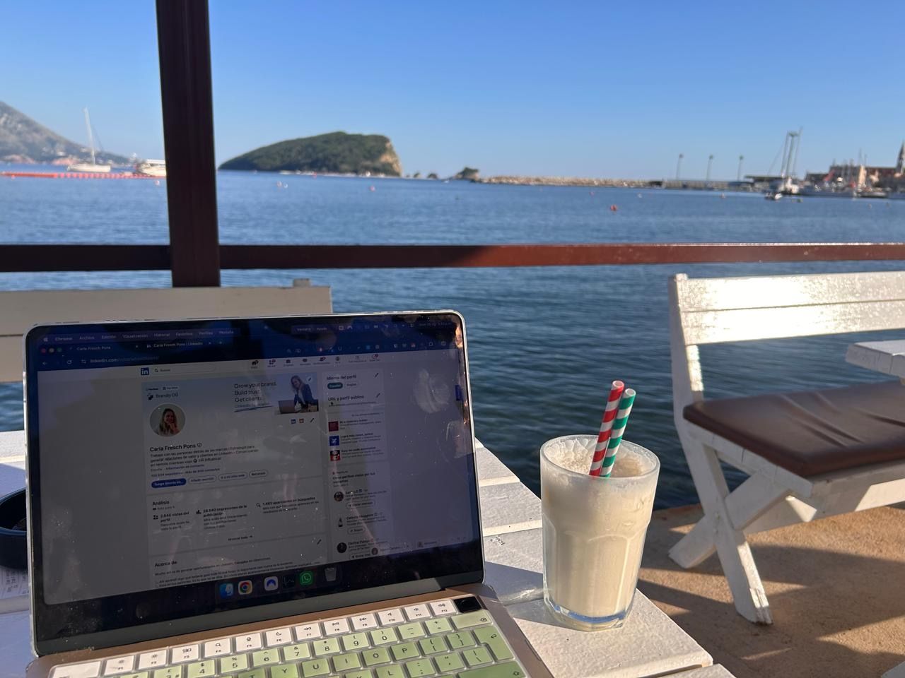 Working on a laptop by the sea in Budva