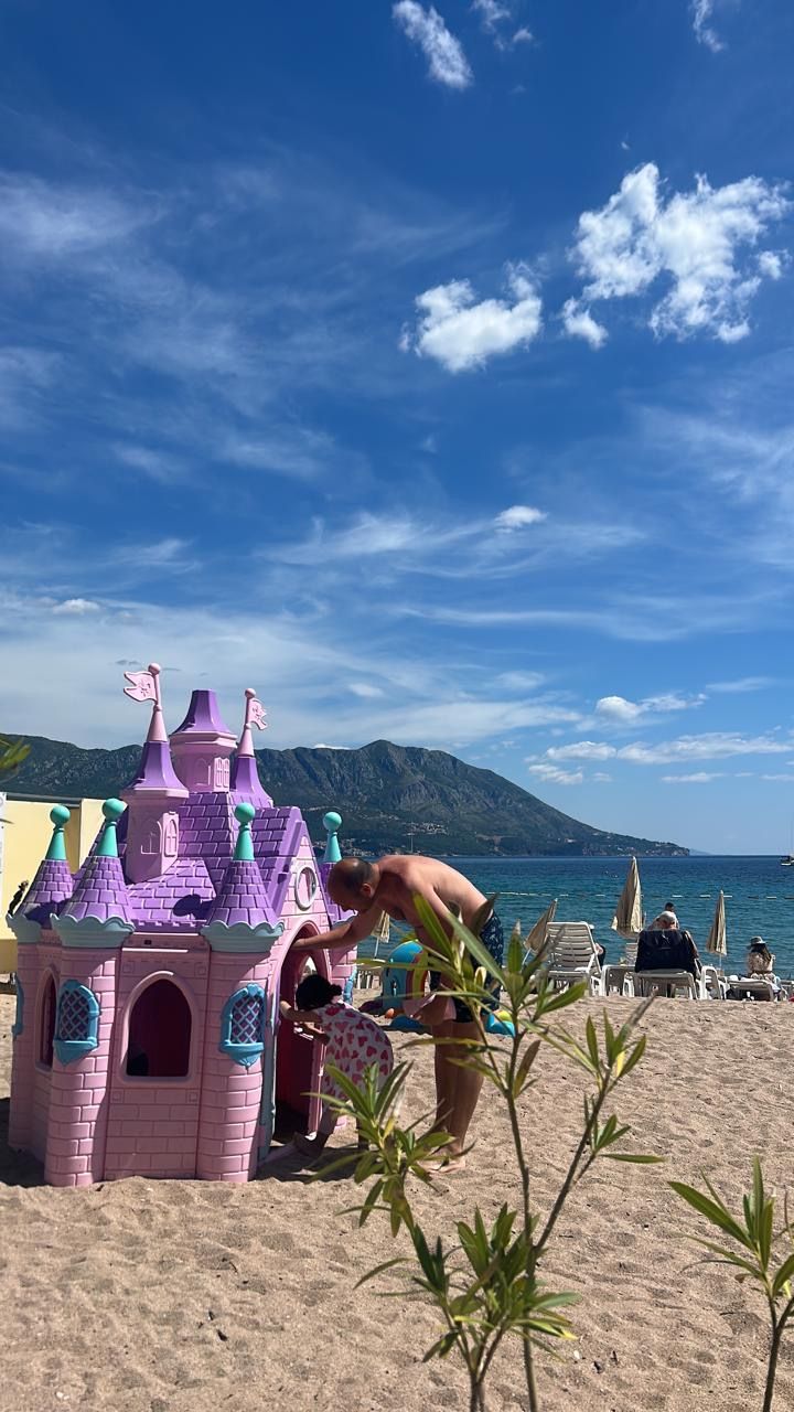 Pink princess castle on a beach in Budva