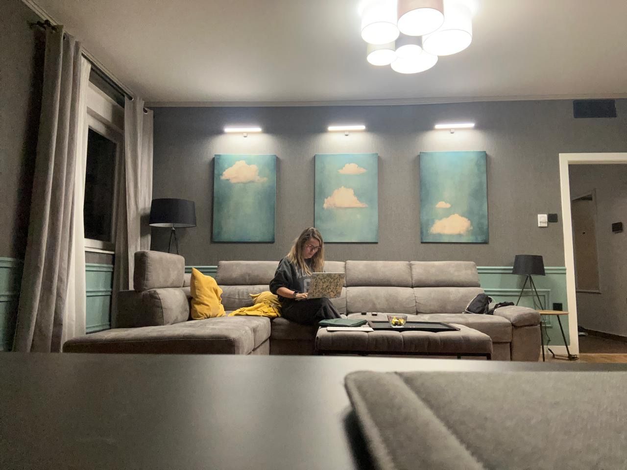 Carla working in the living room of the Airbnb in Trebinje