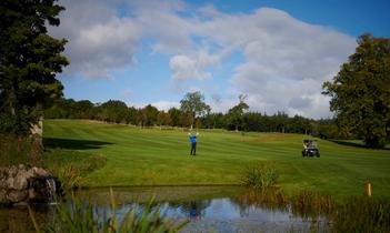 Chris Robb, practice range & bucket of balls