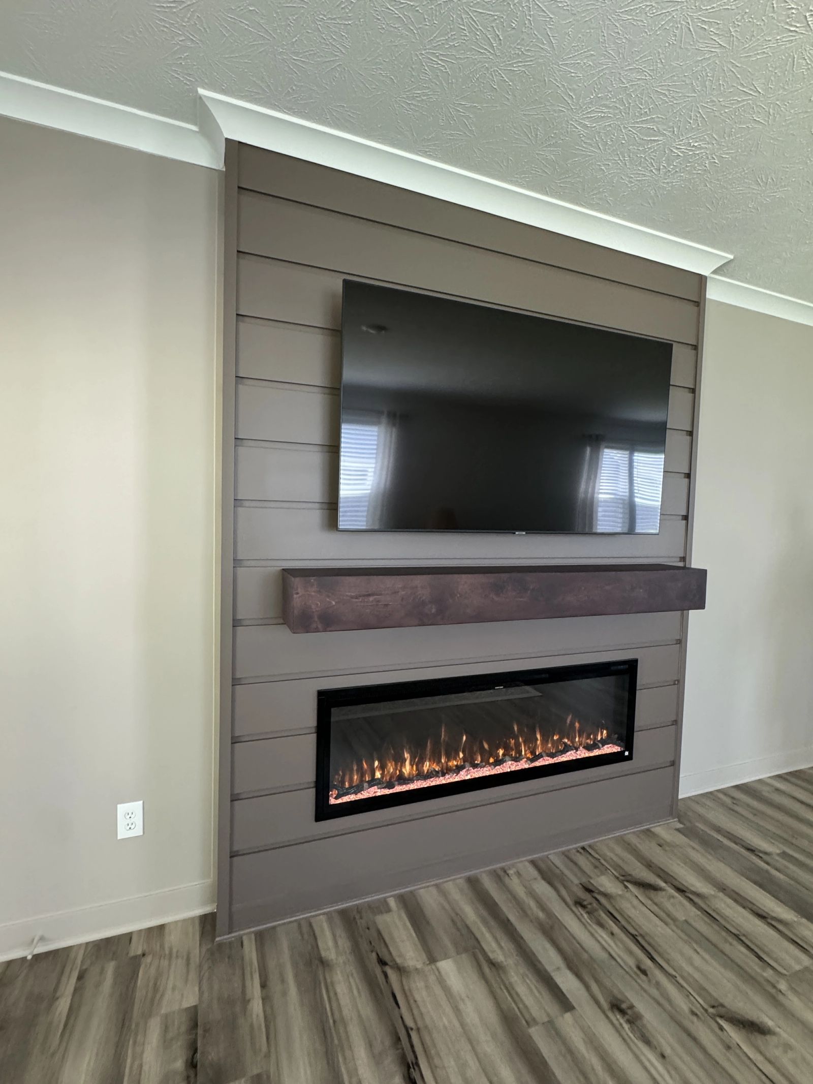 Westfield interior millwork showing custom shiplap fireplace surround