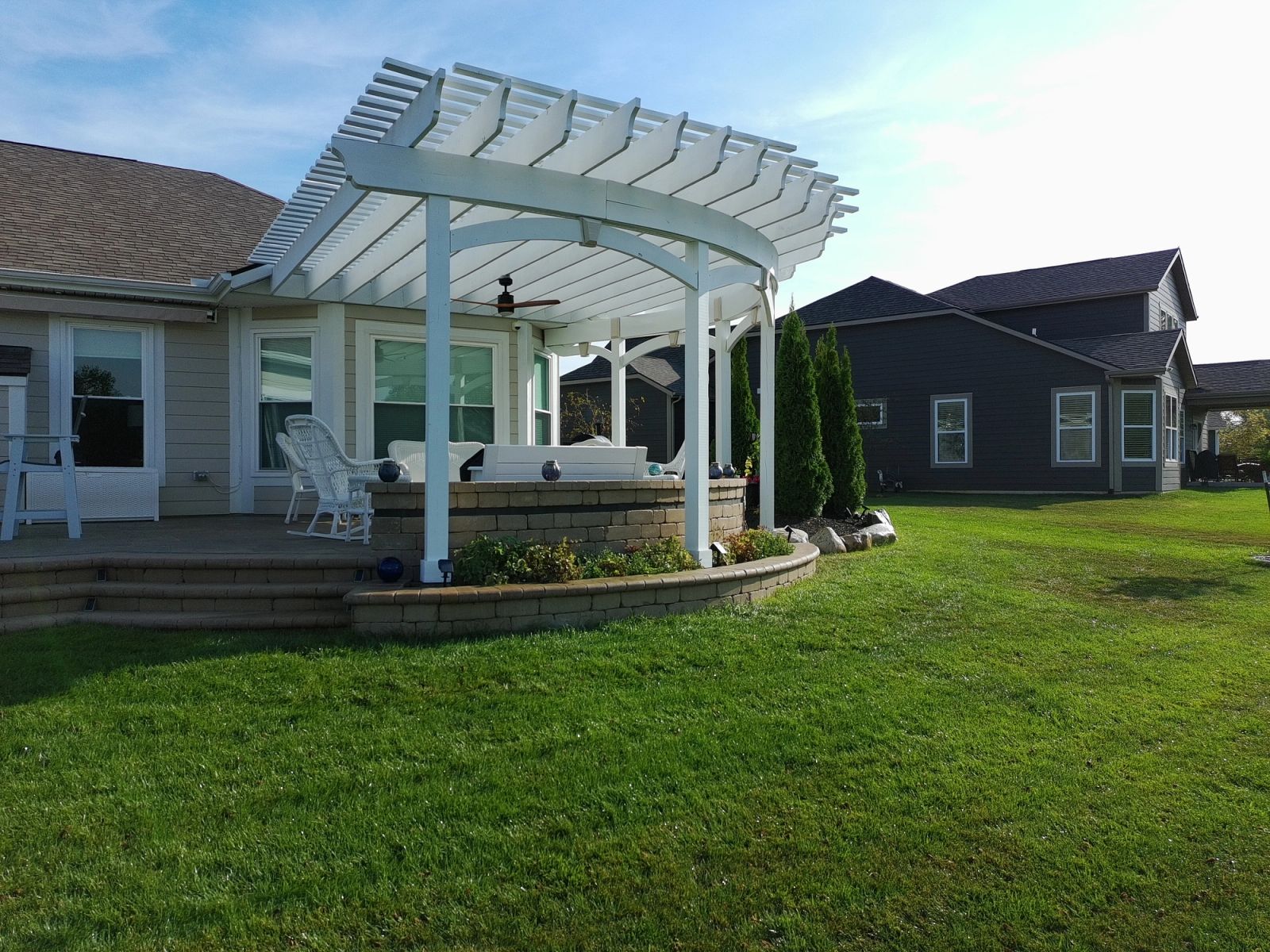 Plainfield residential pergola construction showing architectural details and deck integration