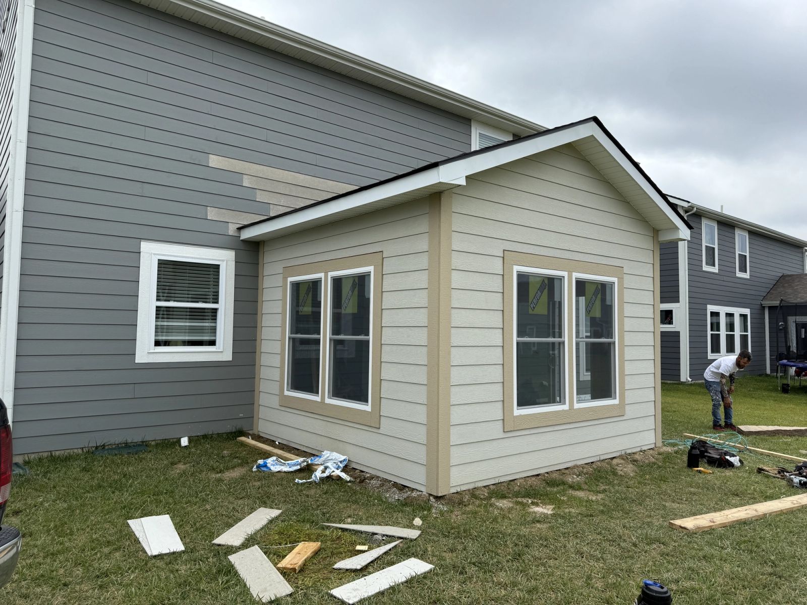 Beech Grove room addition under construction showing framing and siding installation