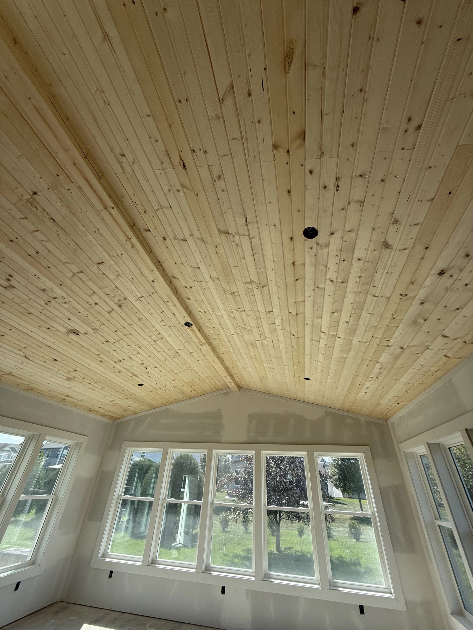 Residential sunroom construction in Avon showing completed exterior