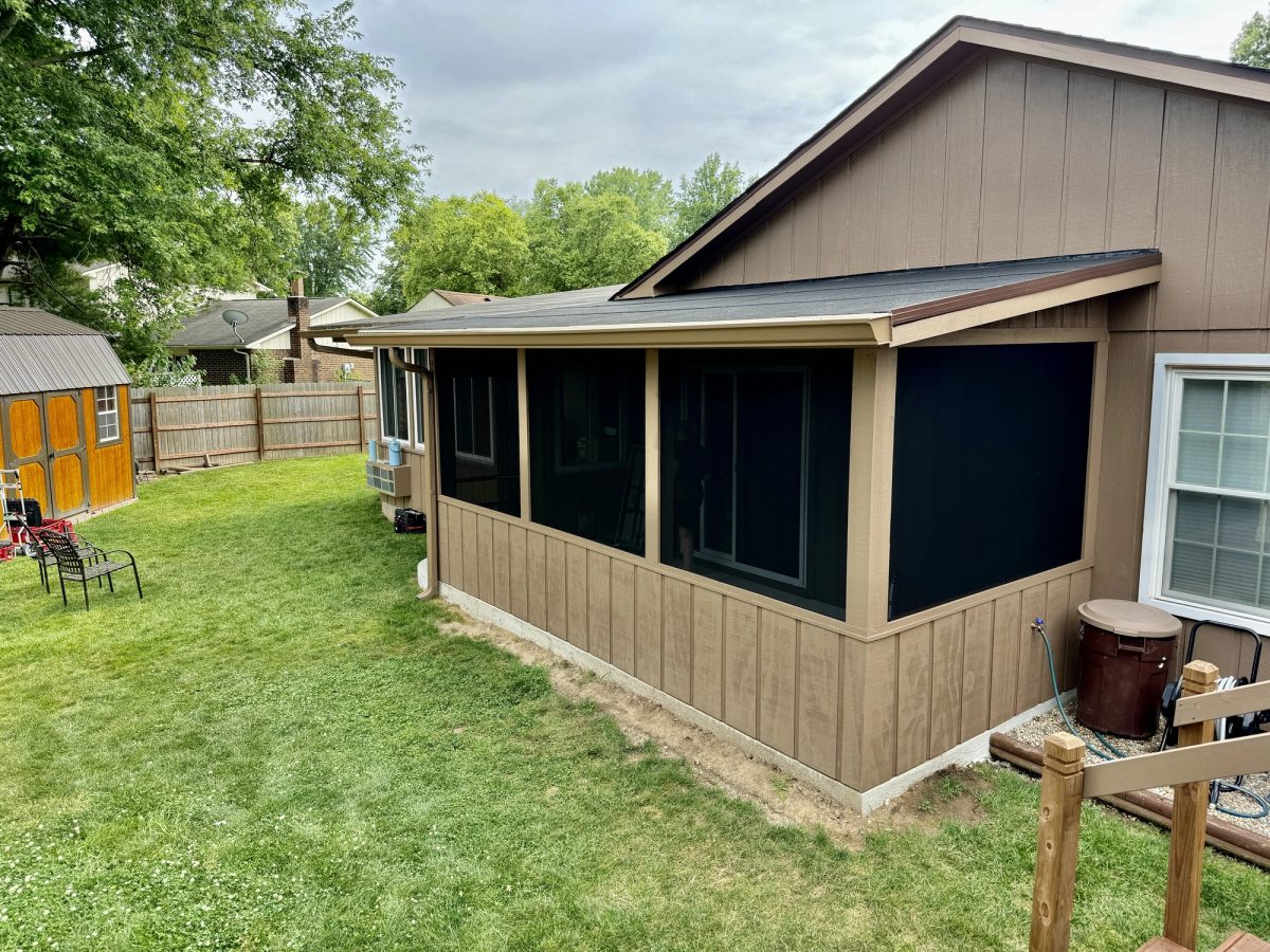 Completed screened porch addition in Noblesville Indiana with vertical siding