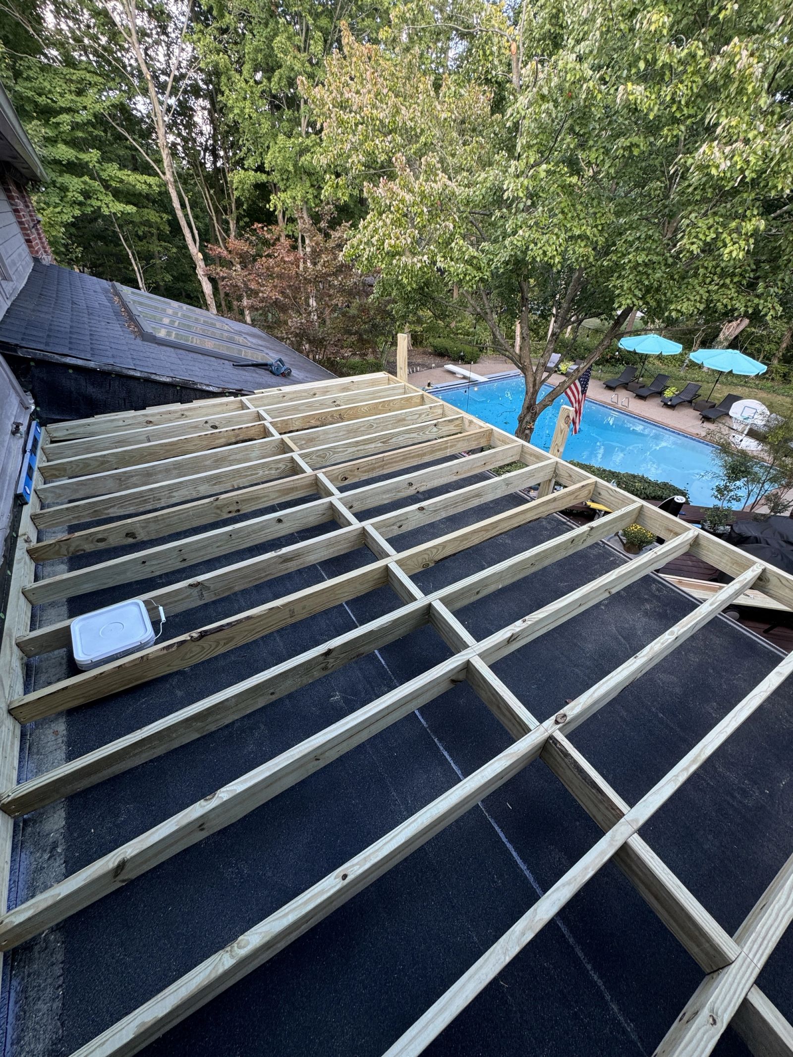 Second-story deck construction in McCordsville with structural platform