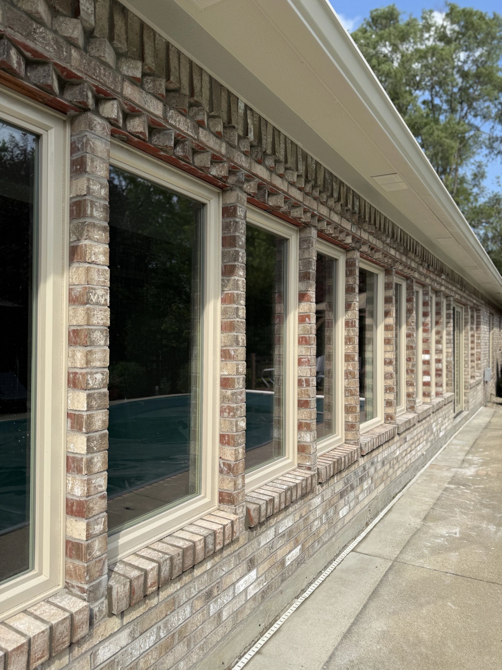 Lawrence home renovation showing transformed screened porch to enclosed sunroom