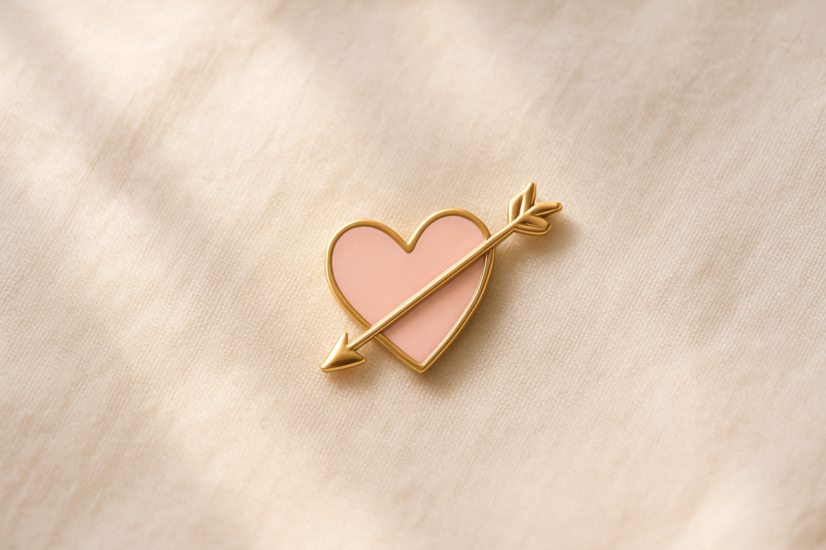 Heart and arrow charm symbolizing self-love