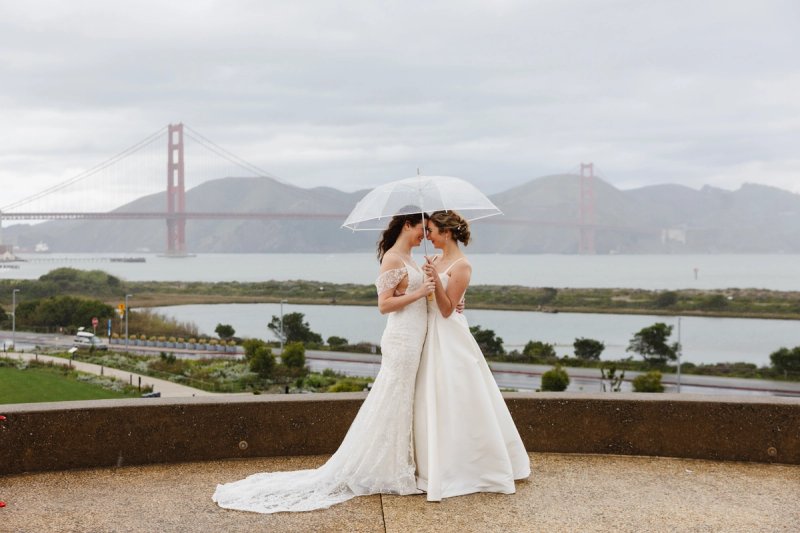 Sofia & Nora's Rainy-Day Wedding at the Officers' Club
