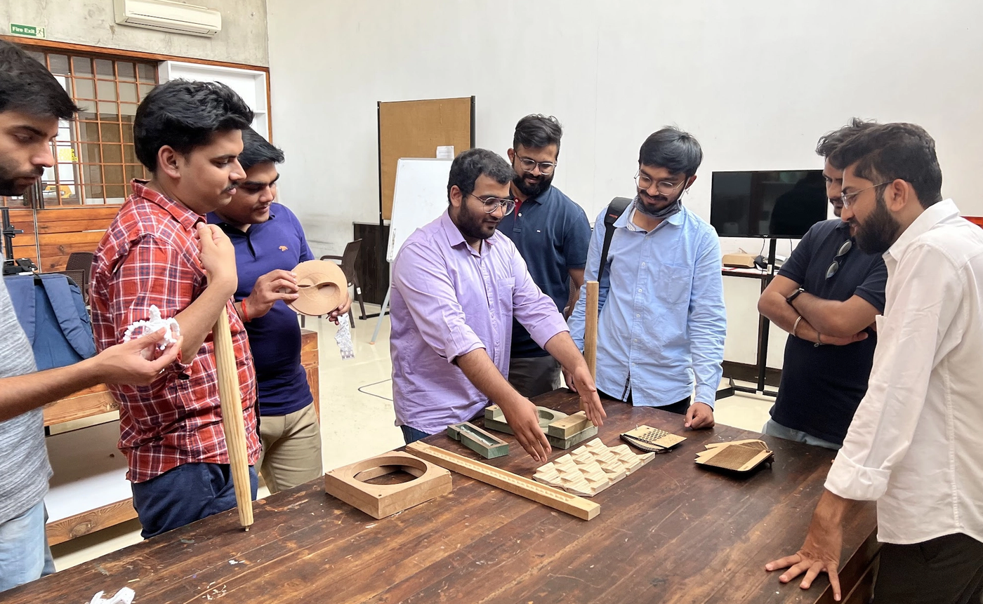 Participant understanding the Woodworking Process at India's First Fablab at CEPT University, Ahmedabad