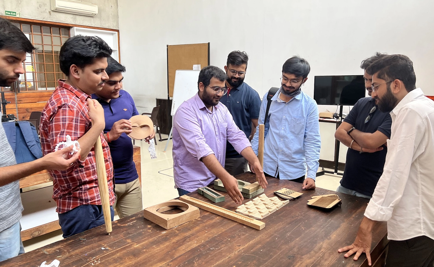 Participant understanding the Woodworking Process at India's First Fablab at CEPT University, Ahmedabad