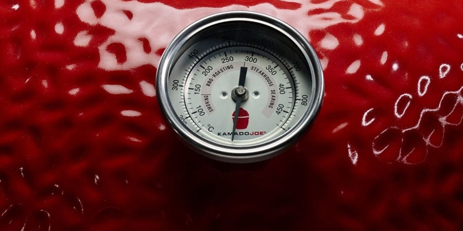 Controlling temperature in a Kamado