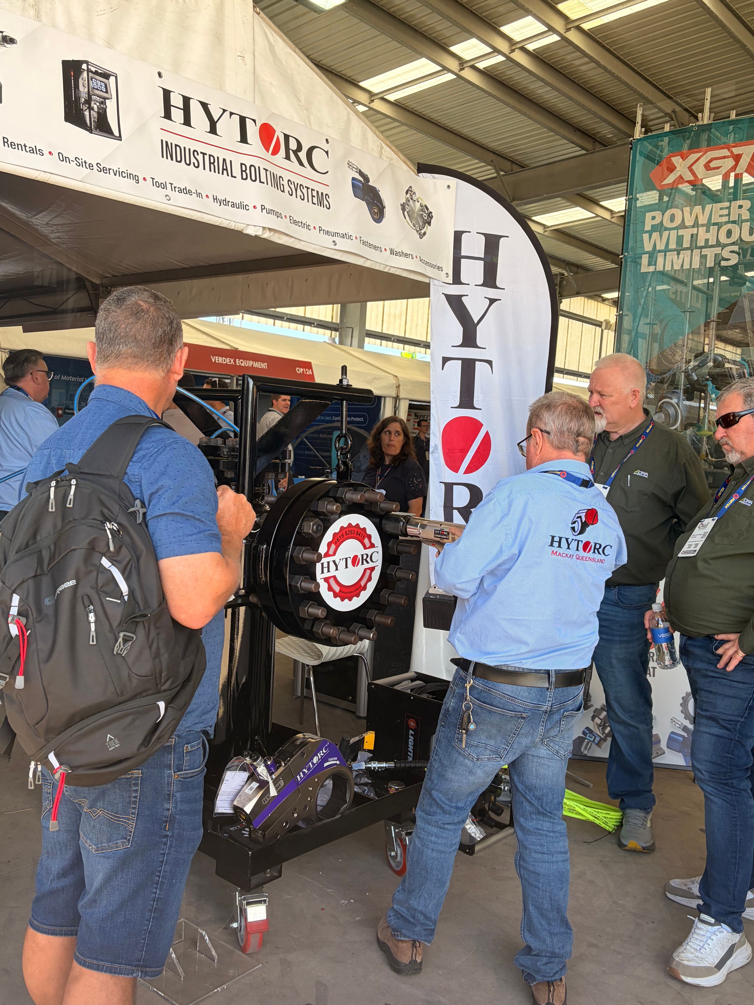 HYTORC Australia Queensland Mining & Engineering Exhibition people doing bolting torque tool demonstration