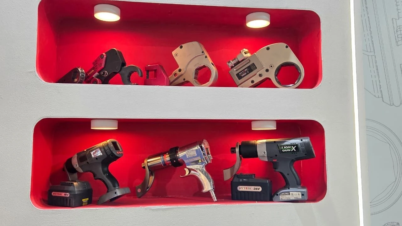 tools on shelf at hytorc booth at Oman Petroleum & Energy Show  opes in muscat oman