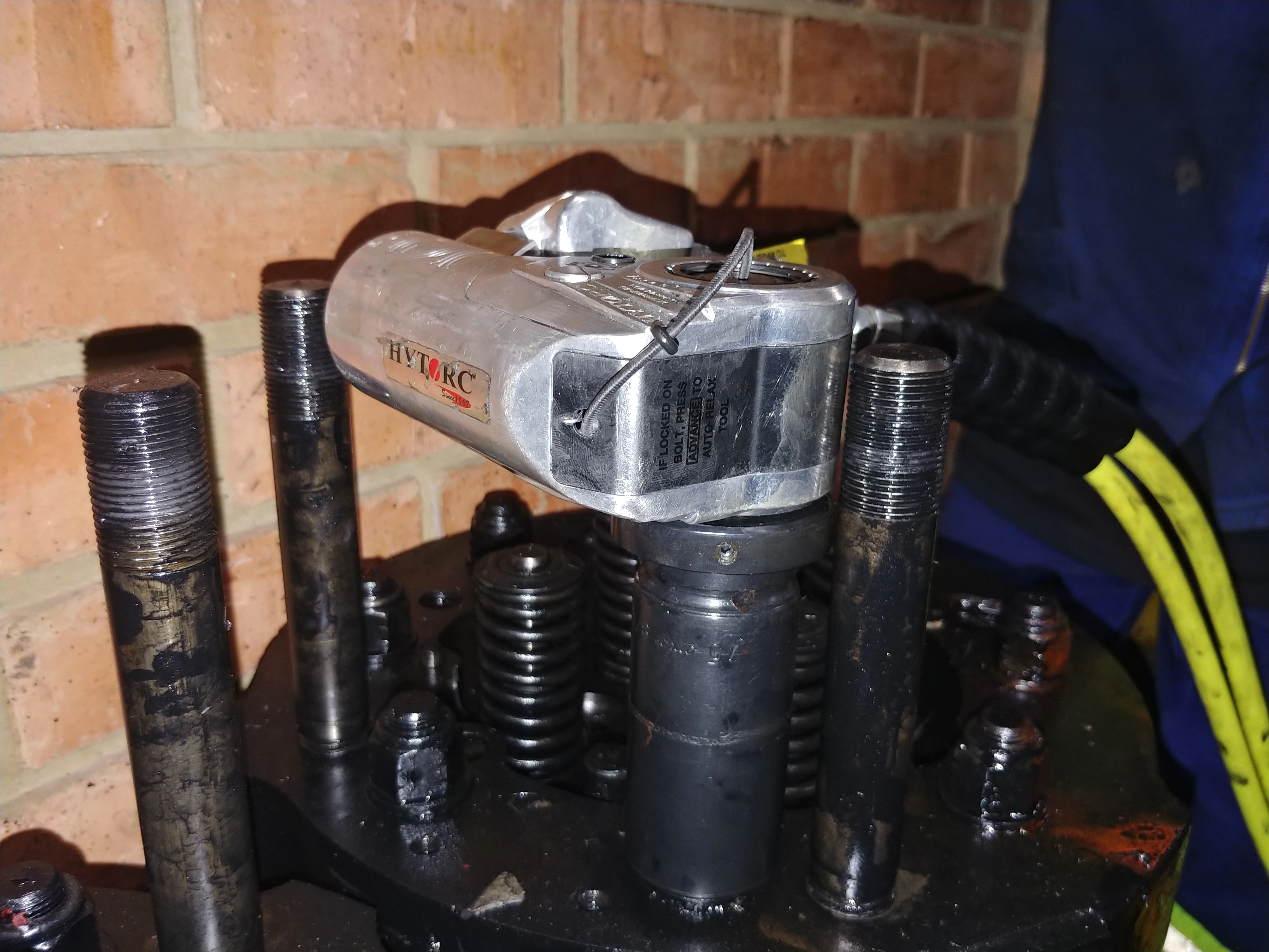 EMD locomotive engine bolting with hytorc hydraulic tool 