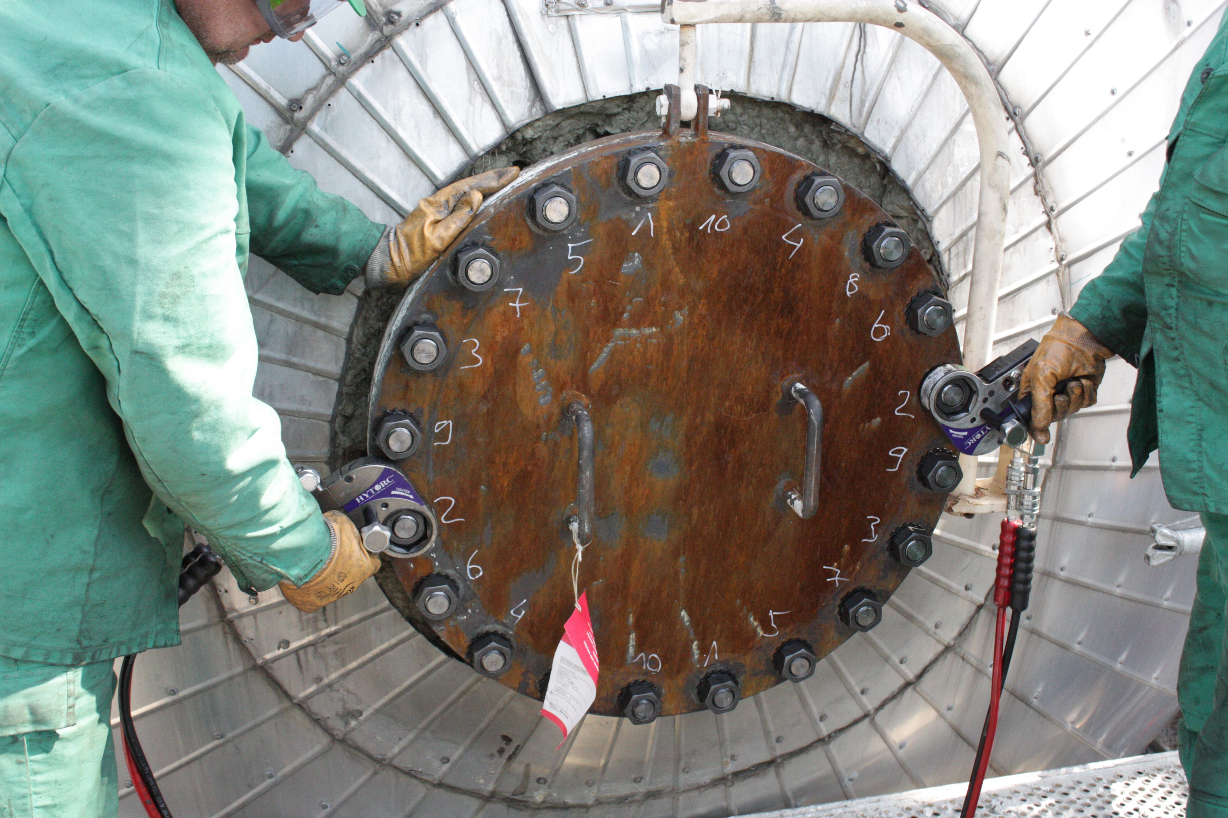 hytorc stealth hydraulic torque tool being used in the field