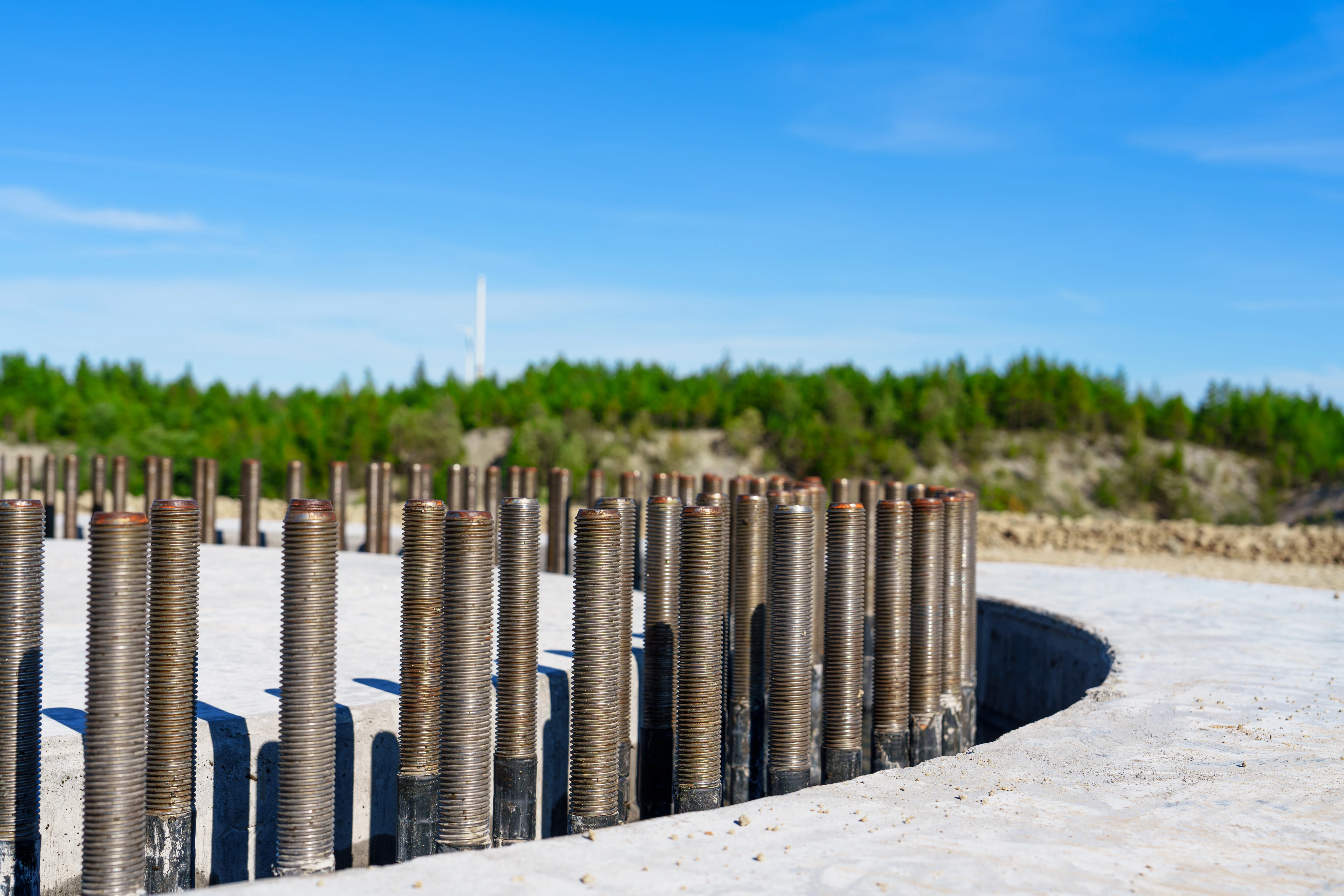 bolts around wind turbine foundation during construction