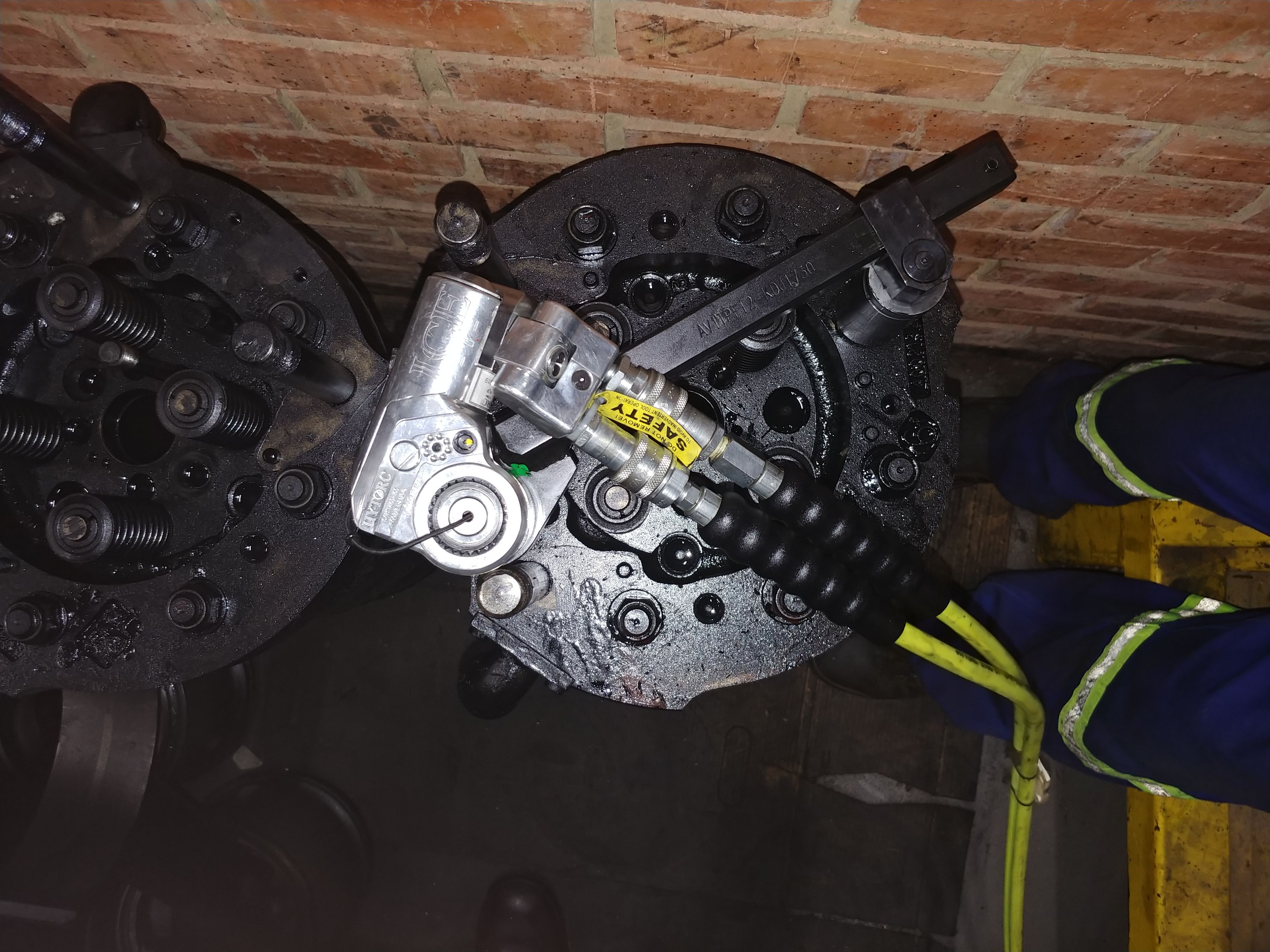 EMD locomotive engine bolting with hytorc hydraulic tool 