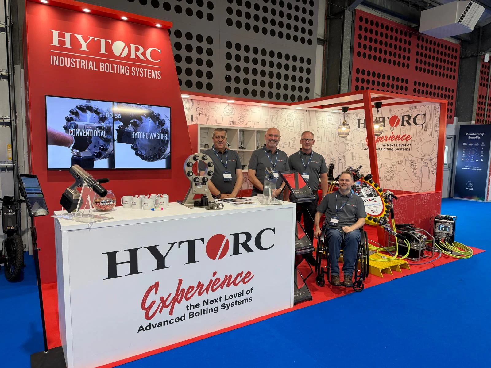 team at hytorc booth at uk energy trade show expo