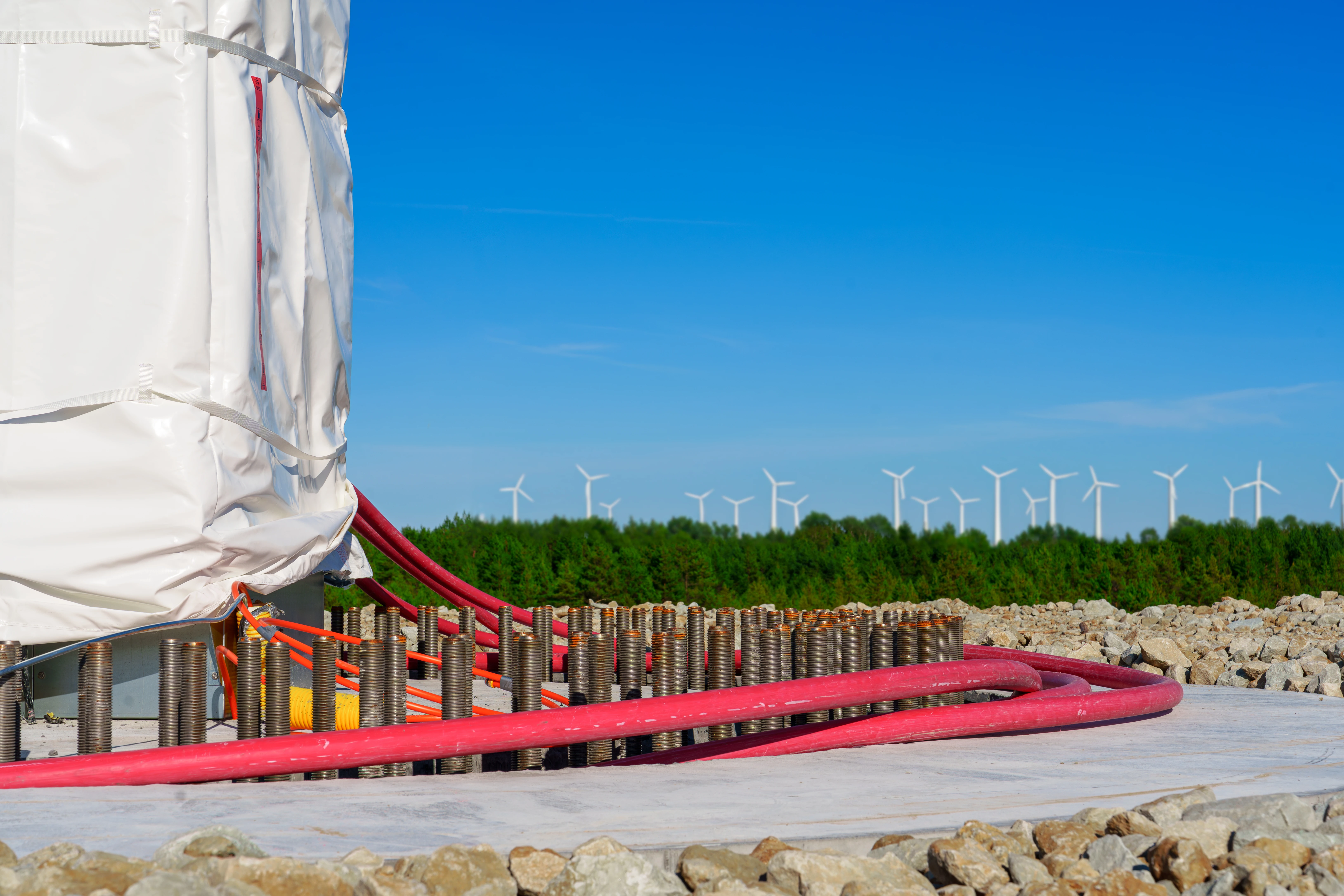 bolts around wind turbine foundation during construction