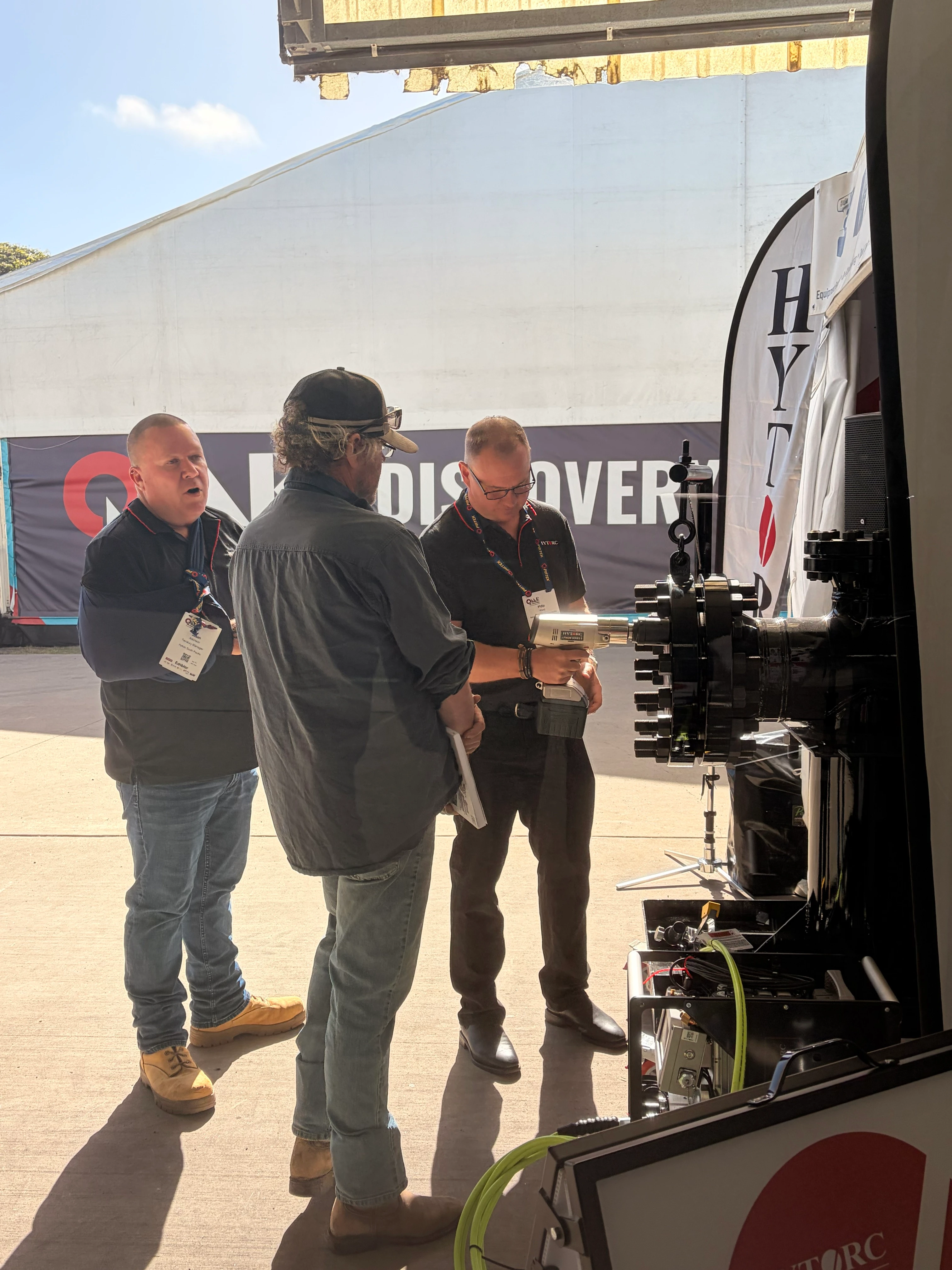 HYTORC Australia Queensland Mining & Engineering Exhibition people doing bolting torque tool demonstration